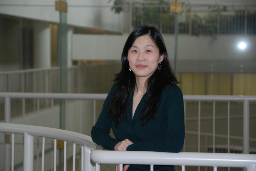 Assistant Professor Ying Zhang's professional photo shoot, taken on the 3rd floor of Drake Centre. 
