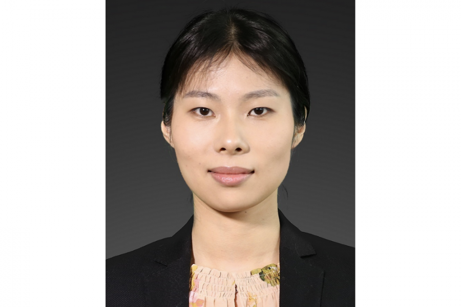 Assistant Professor Zhenzhen Fan's professional headshot. She is wearing a black blazer and a floral blouse