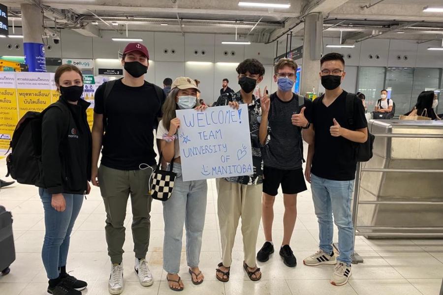 Undergraduate students being welcomed at the airport in Thailand