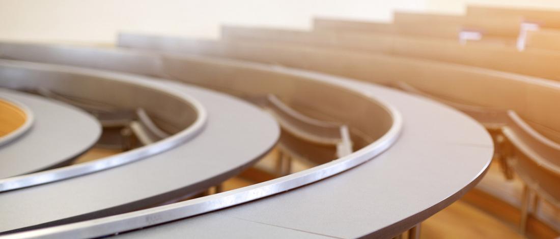 Circular tables in a classroom.