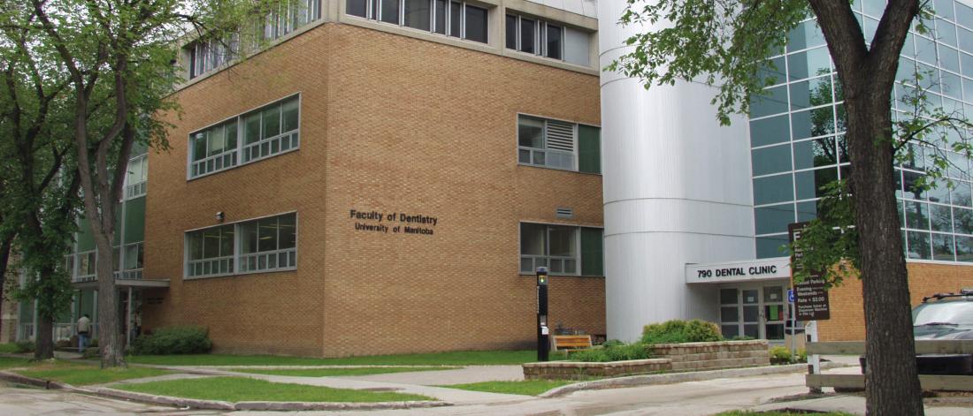 Exterior view of the front entrance of the dentistry building.
