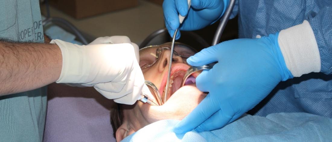 Patient undergoing dental surgery.