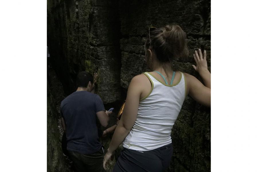 two researchers exploring the pine dock limestone caves.