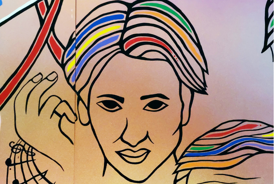 painted artist face with rainbow hair