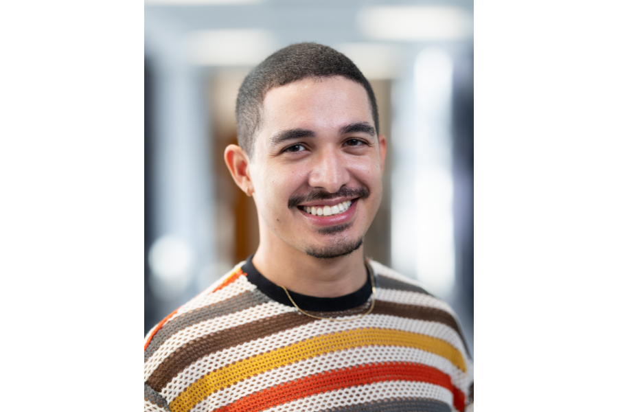 young man with very short brown hair and facial hair