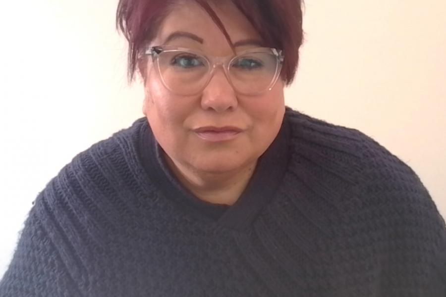 woman with glasses and short hair
