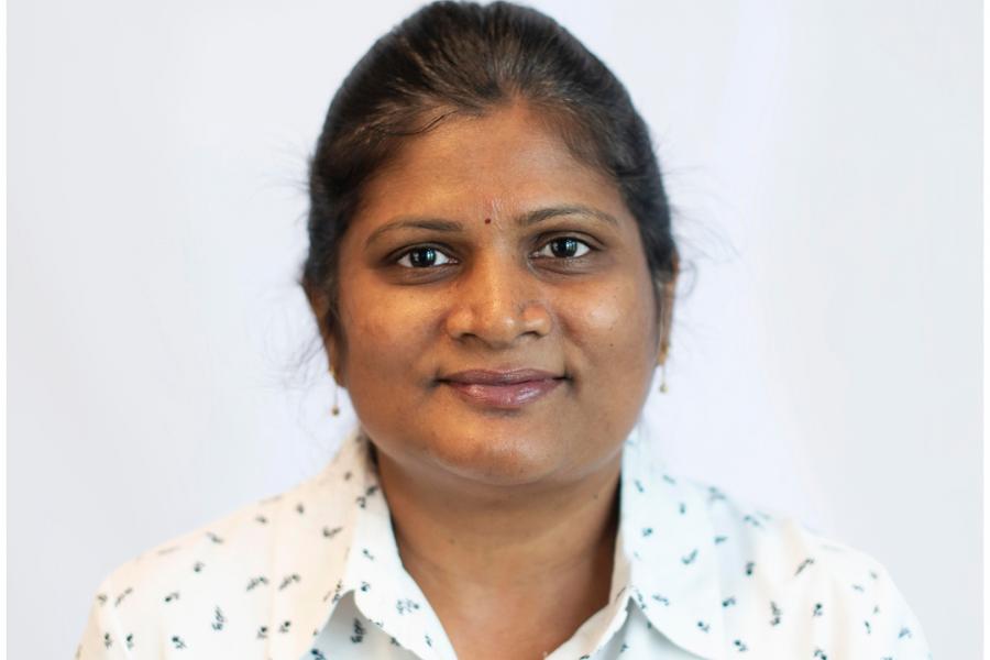 Chandra Rajulapati smiling and posing for the camera