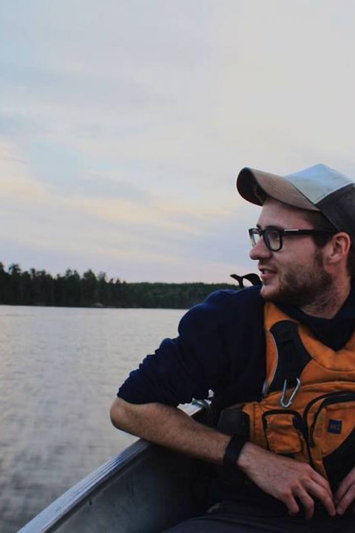 Tyler Black in canoe