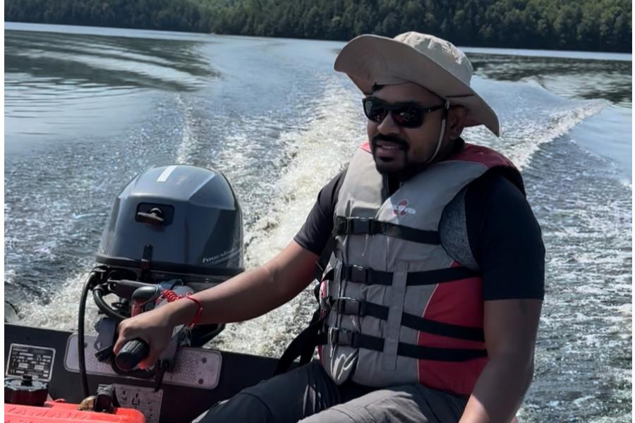 A picture of a man sitting in a boat