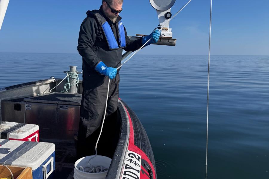 Dr. cj mundy sampling water in hudson's bay