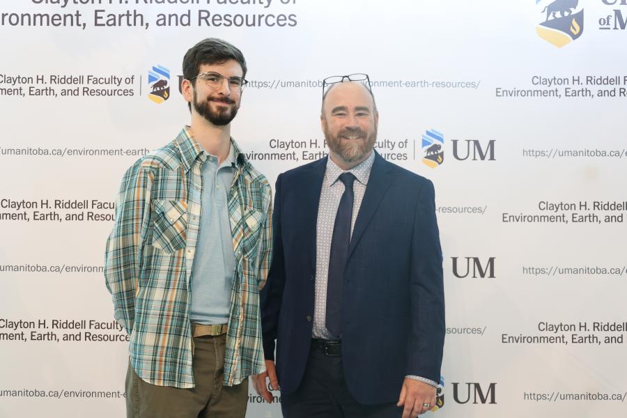 Adam Isaak with Acting Dean Mark Hanson