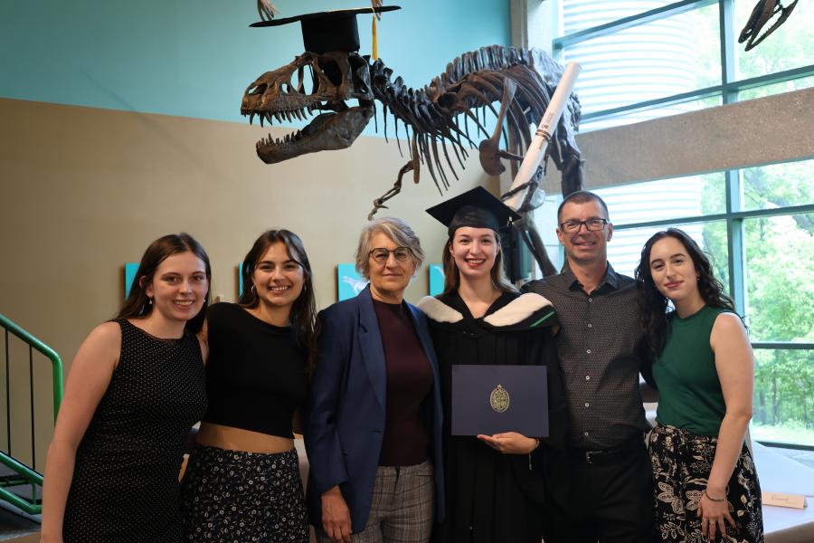 Grad with guests with George the Gorgosaurus