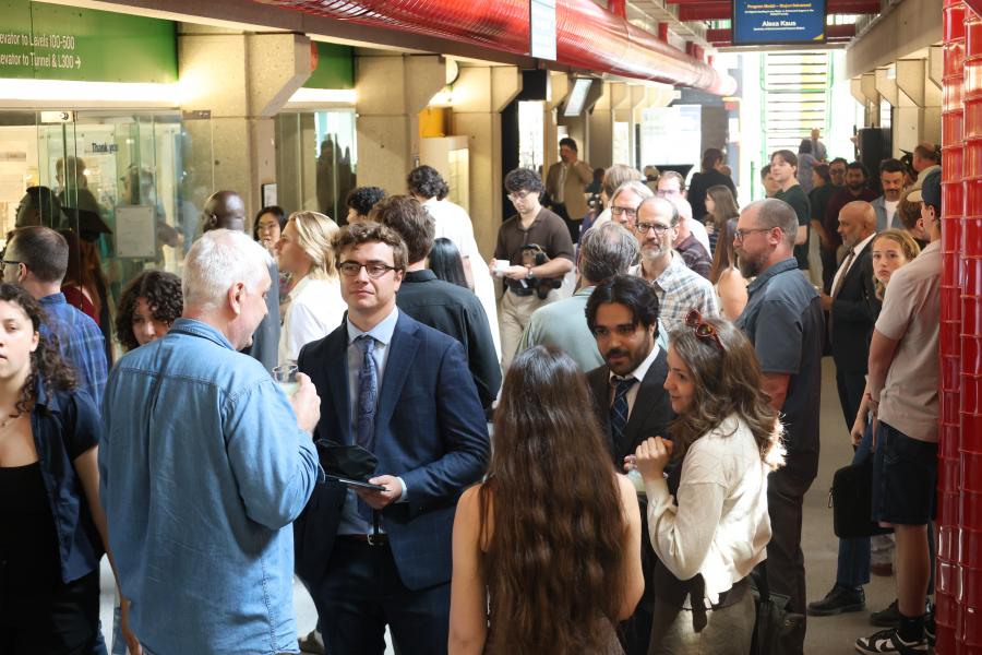Wallace building hallway packed with graduates and supporters