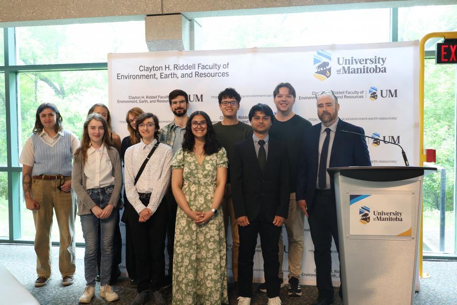 9 of the Summer Research Awardees with Acting Dean Mark Hanson