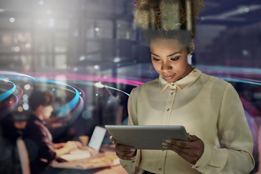 Leader using AI technology on a tablet