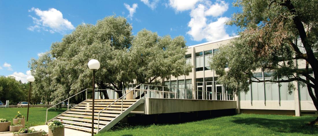 An exterior view of the front entrance to the Russell building.