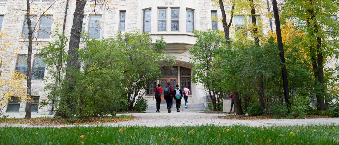 Students entering the Tache Arts building at the University of Manitoba Fort Garry campus.