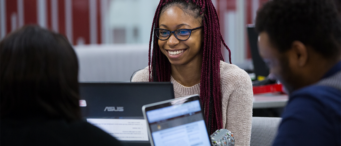 A group of student studying in Elizabeth Dafoe Library.