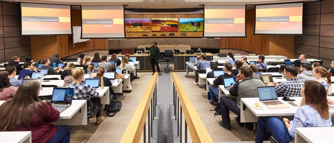 Professor Khoday teaching a class in the Moot Courtroom at Robson Hall.