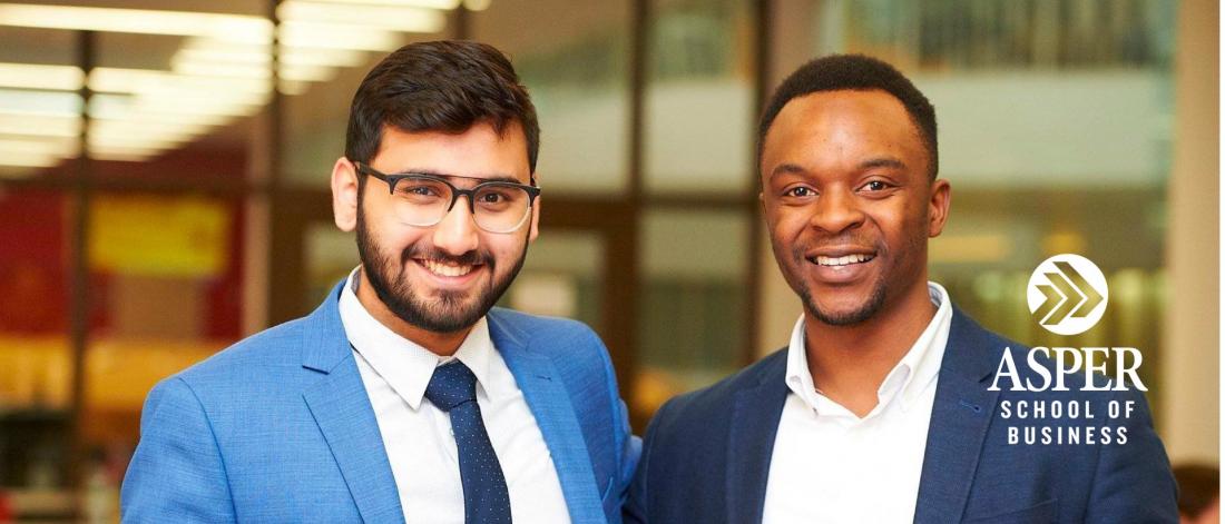 Image of two male students in formal wear.