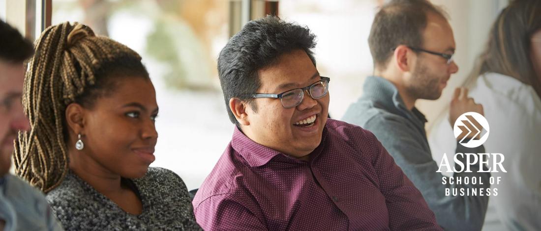 Image of multi-ethnic students engaging in conversations.