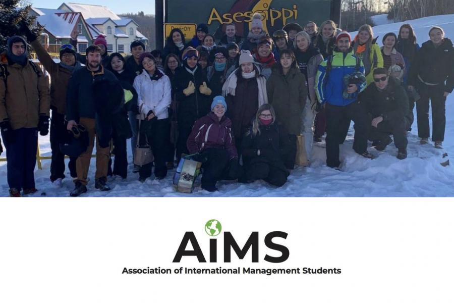 Members of the International management students association stand together for a group photo at Asessippi  Ski hill and resort.