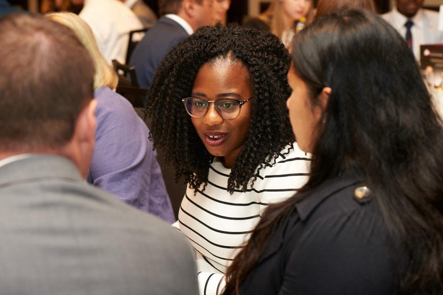 Students seated together at an event.