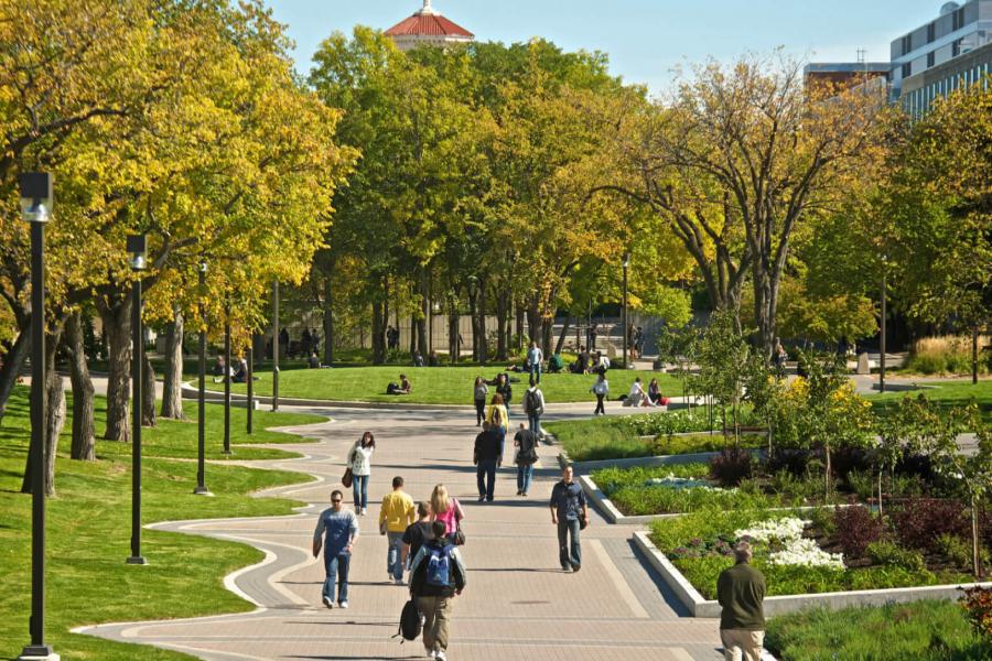 A busy outdoor walking path at the University of Manitoba Fort Garry campus. 