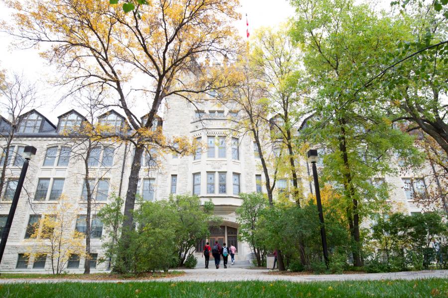 Students entering the Tache Arts building at the University of Manitoba Fort Garry campus.