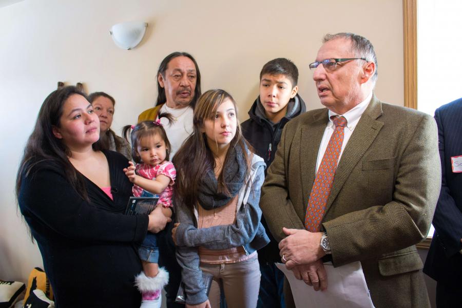 Dr. Brian Postl with a family.