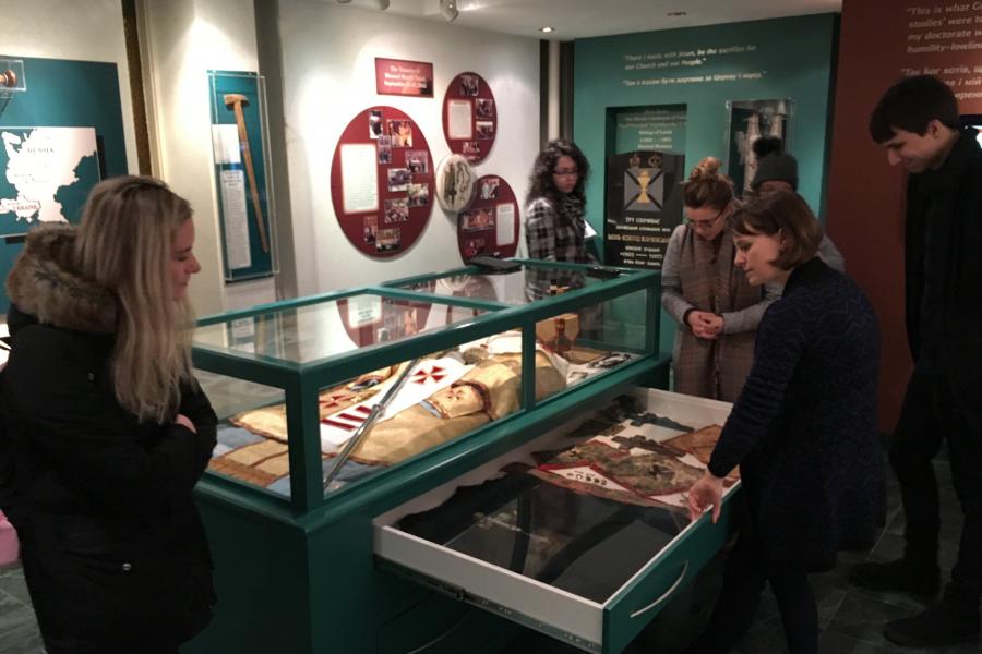 Students looking at artifacts