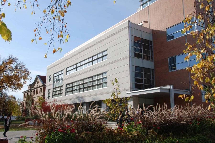 Exterior of a modern looking brick and concrete building.