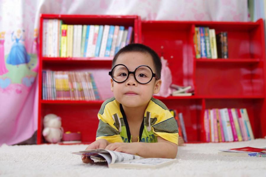 Child wearing glasses.