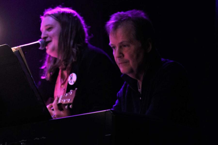 Professor Mel Braun plays piano in concert with guitarist Micah Braun.