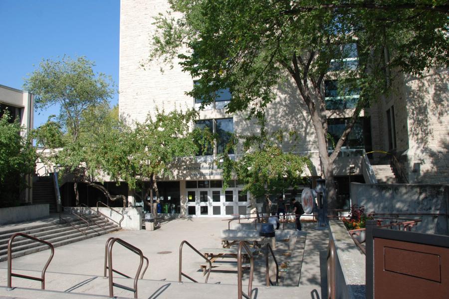 The exterior five doors that lead to the Faculty of Arts Fletcher Argue Building.