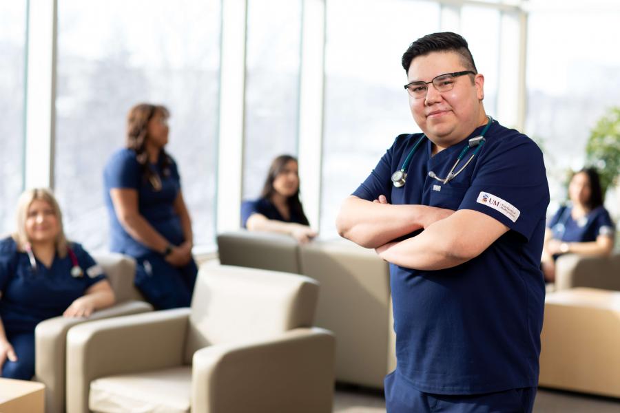 Group of students in a nursing lounge area.