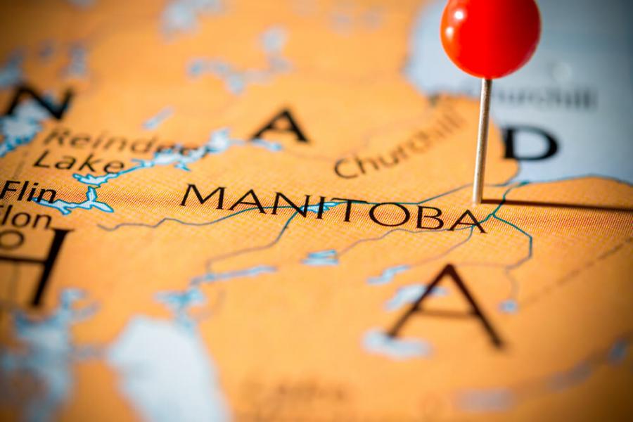 red pin in a map indicating Manitoba