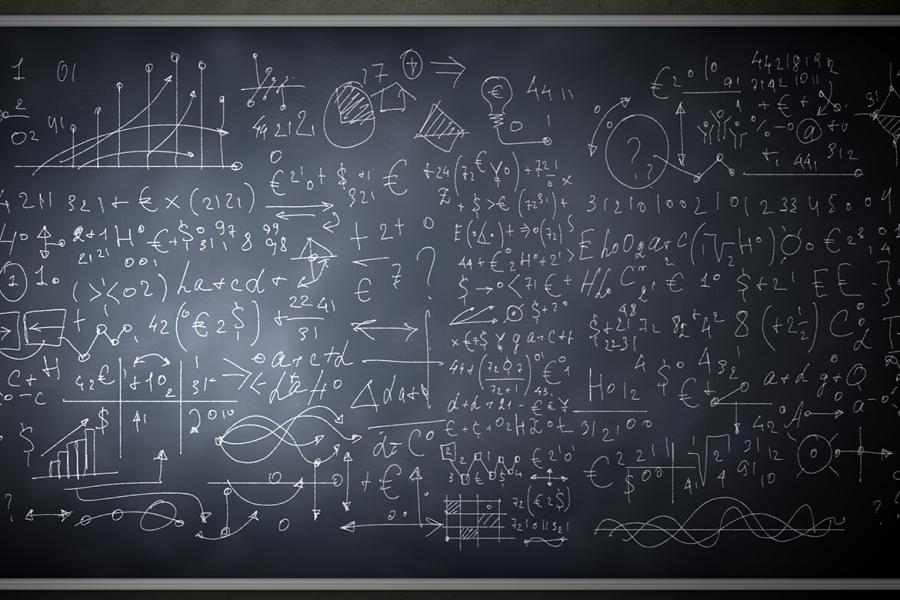 Science and math equations on chalkboard