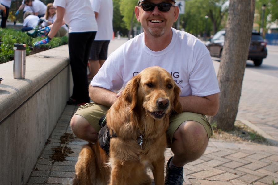 Man with golden retriever