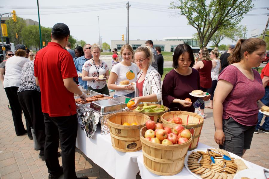 Staff lining up for food