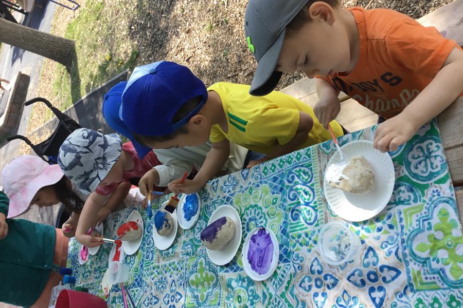 Painting rocks at Campus Children Centre