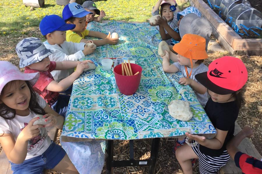 Painting rocks at Campus Children Centre