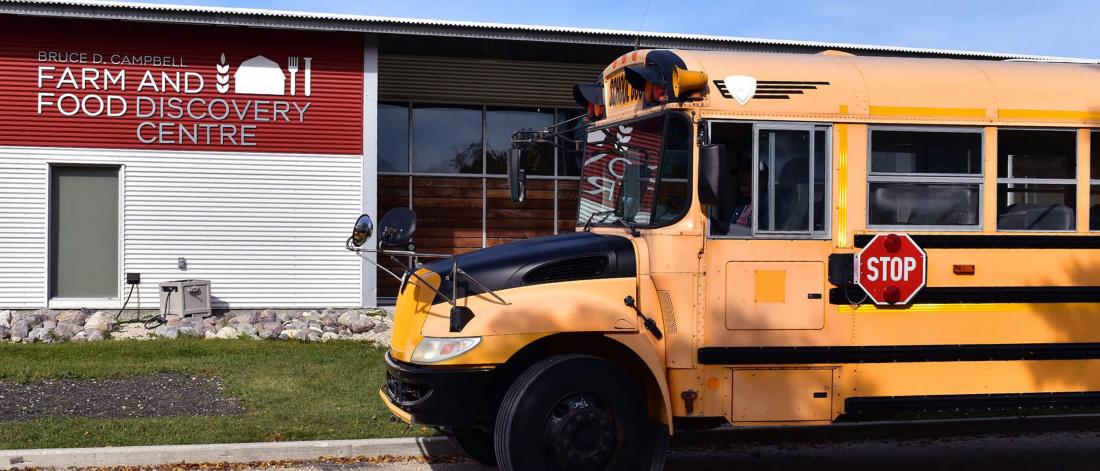 School bus is parked in front of the Centre