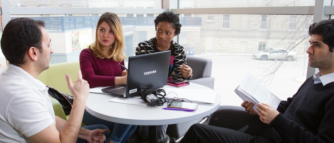 people working around a table