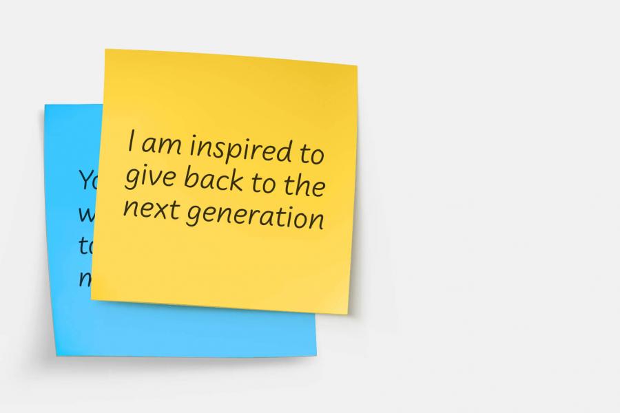 Layered sticky notes with text: I am inspired to give back to the next generation.