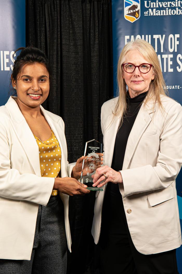 Diane Hiebert Murphy presenting 3rd place to Ruwani Wimalasekara