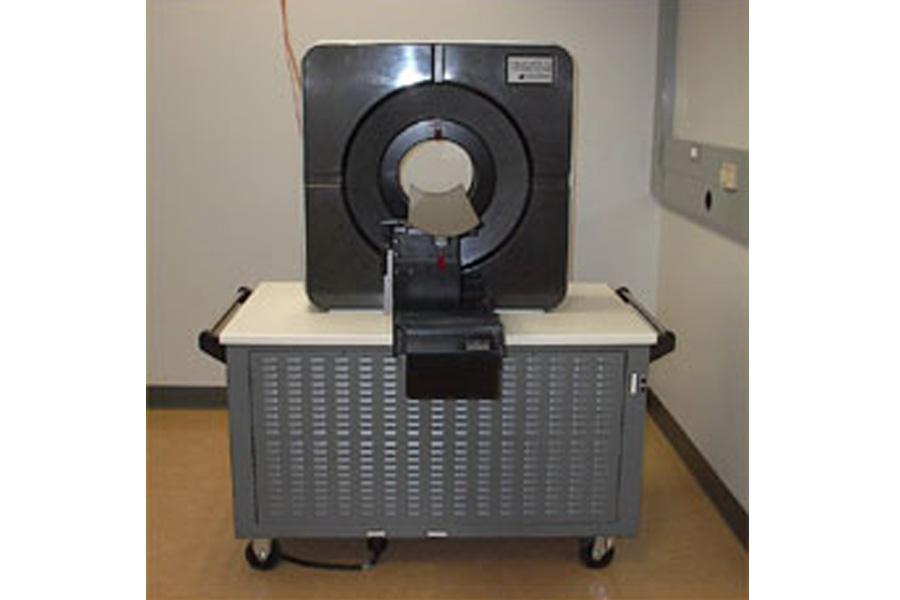 Complex instrumentation called Siemens Preclinical Solutions PET imaging system.
