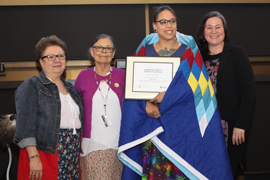 Taylor Galvin accepts Indigenous Award of Excellence