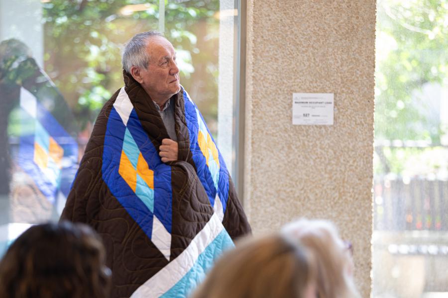 Honouree wrapped in star blanket