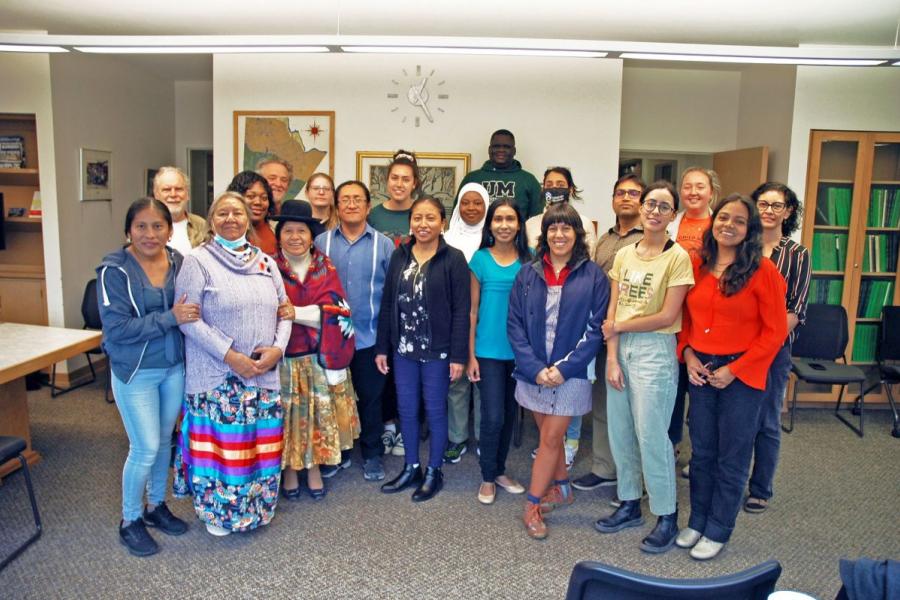Indigenous community members, students and staff stand together during a collaborative workshop at the University of Manitoba.